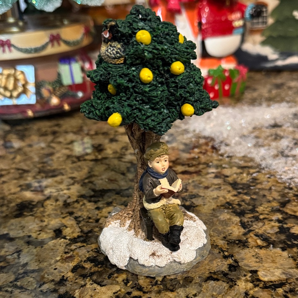 Holiday Tree Figurine with Child & bird in tree